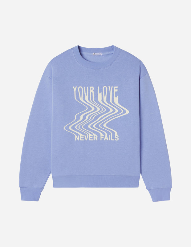 Love Never Fails Blue Unisex Crewneck Christian Sweatshirt